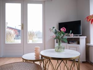 Gezellig chalet met 2 slaapkamers en zicht op het water