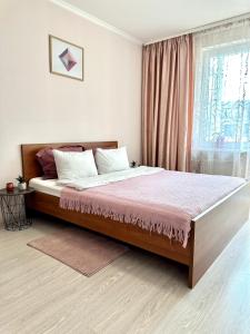 Apartments with a coffee machine in the city center, near a park and Zlata Plaza