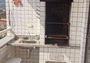 Apartamento a 900m da praia da Enseada