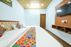 FabHotel Royal Om River Resort
