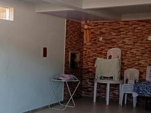 Casa 4 Quartos garagem 3 carros, churrasqueira e ar condicionado,