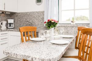 Haus-Kaept-n-Hein-Cors-1-OG-DG