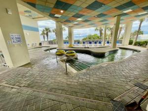 Oceanview Modern 1BR, king bed at Carolinian Resort"