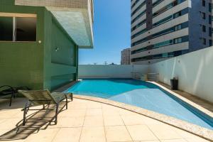 Loft beira mar com banheira