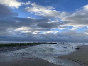Steps from the quiet seaside path