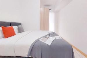 Good and Comfortable 2BR M-Town Residence Apartment By Travelio