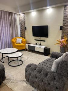 fabulous homes in kilimani apartment with amazing breathtaking city views, swimming pool, ample parking space and children playground area