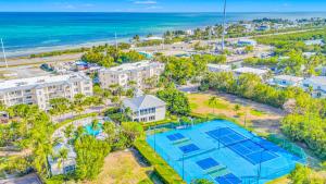 Ocean View Penthouse Retreat amenities: tennis court heated Pool Vista Key Two