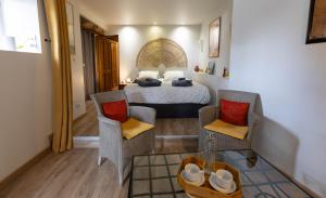 Chambres dHôtes et Suites à La Ferme de lOudon & SPA