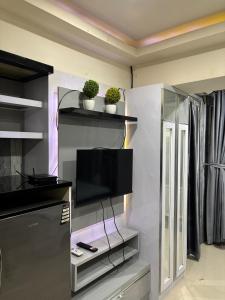 apartemen jardin cihamplas byParty Room