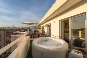 Bright Beachside Flat with Terrace by HostWise