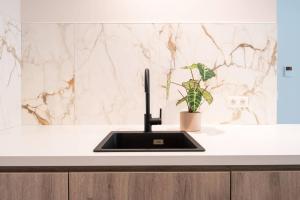 Brand new apartment with garden and parking