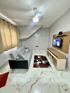 Casa Completa a 70m da praia garagem WIFI