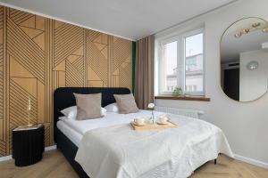 Elegant Studio for 2 Guests Near Spodek by Noclegi Renters