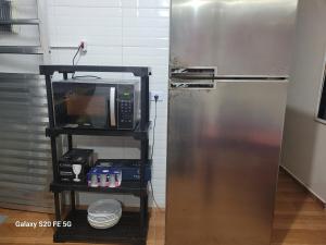 Casa inteira 2 dormitorios em Mongagua, com ar condicionado smart TV, Wi-Fi