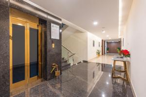Treebo Premium Pine Tree Courtyard