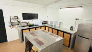 56L Portugis Homestay