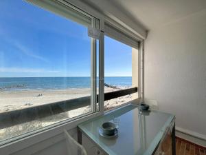 Studio cabine face mer avec parking privé - 3 couchages - FR-1-715-35