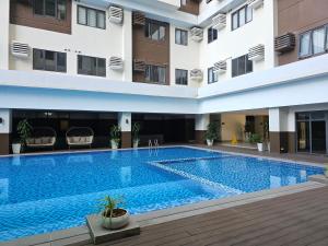 Cozy Luxe Apartment Hotel Feels, Home Comfort walk to IT Park, Netflix, Wifi, Pool