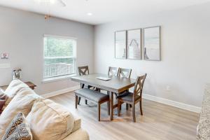 Inviting townhouse with golf nearby pool central AC W&D working desk & chair