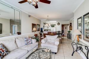 Eclectic gulf front condo with free WiFI two pools hot tub & easy beach access