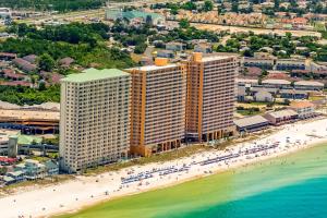 Eclectic gulf front condo with free WiFI two pools hot tub & easy beach access