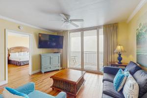 Roomy retreat on the water with private balcony shared pool & beach access