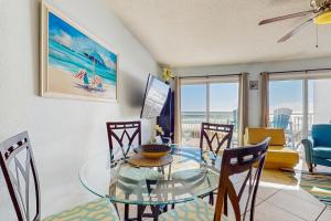 Cozy beachfront condo with private balcony shared pool and beach access