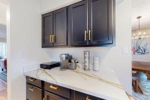 Updated townhome with grassy yard grill open layout W&D & AC