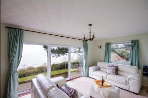 Windwhistle coastal views of Looe Bay cliffs