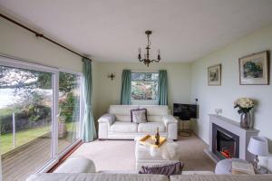 Windwhistle coastal views of Looe Bay cliffs