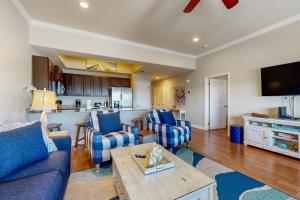 Gated-entry condo near the beach with pool hot tub & private balcony