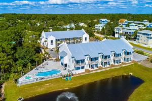 Second floor coastal condo with pool & hot tub access WiFi central AC and W&D