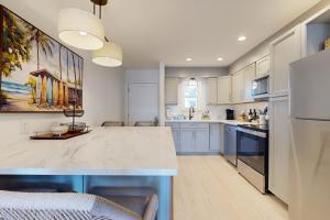Courtyard view condo with private beach access private balcony & free WiFi