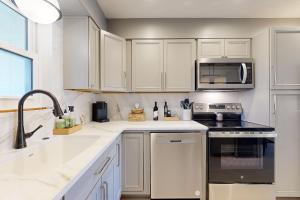 Courtyard view condo with private beach access private balcony & free WiFi