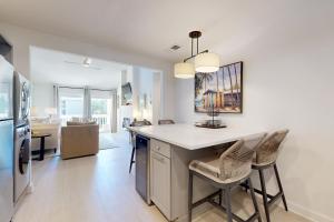 Courtyard view condo with private beach access private balcony & free WiFi