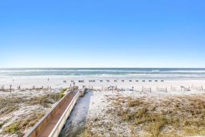 Bright third-floor Gulf-front condo with views - close to entertainment