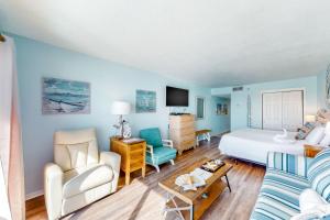 Snowbird-friendly oceanfront condo with ocean view central AC & beach service