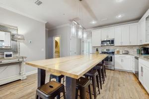 Spacious private home with patio balconies close to beaches & shared pool