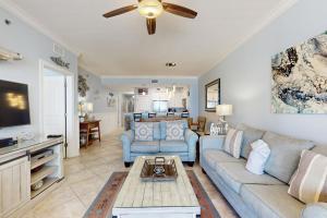 Stunning gulf front condo steps from the sand with shared pool hot tub & more