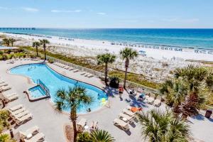 Gorgeous condo with beach access a pool hot tub central AC & washer&dryer
