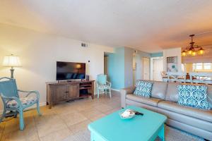 Serene Gulf-front condo with a pool tennis grilling area & beach access