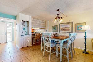 Serene Gulf-front condo with a pool tennis grilling area & beach access
