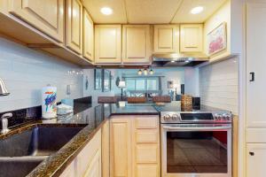 Serene Gulf-front condo with a pool tennis grilling area & beach access