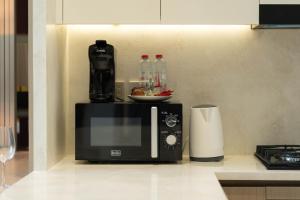 The Royale Blue Suite 610 I JVC I Plunge Pool Parking Gym