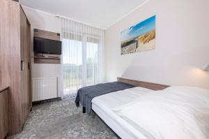 Domki, Apartamenty i Restauracja Włóczęga