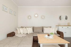 Przytulny Apartament w Centrum Blisko Plaży by Noclegi Renters