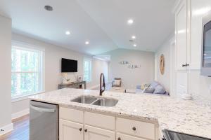 Stylish island condo near the beach with fast WiFi central AC & private W&D