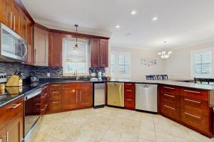 Three story beachfront home with private pool porch and boardwalk to gulf coast