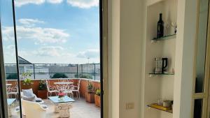 Terrazza Urania - Penthouse terrace with 360 view of Rome